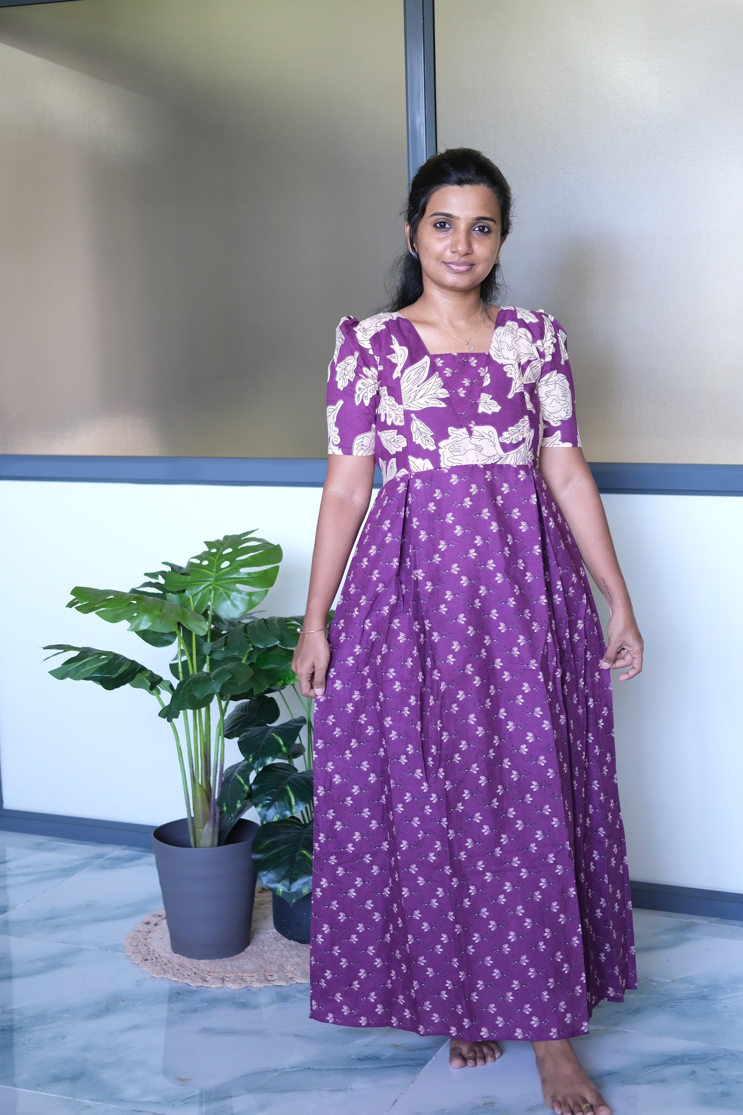 Full-length purple floral feeding nighty with zip and comfortable gathered waist detailing.