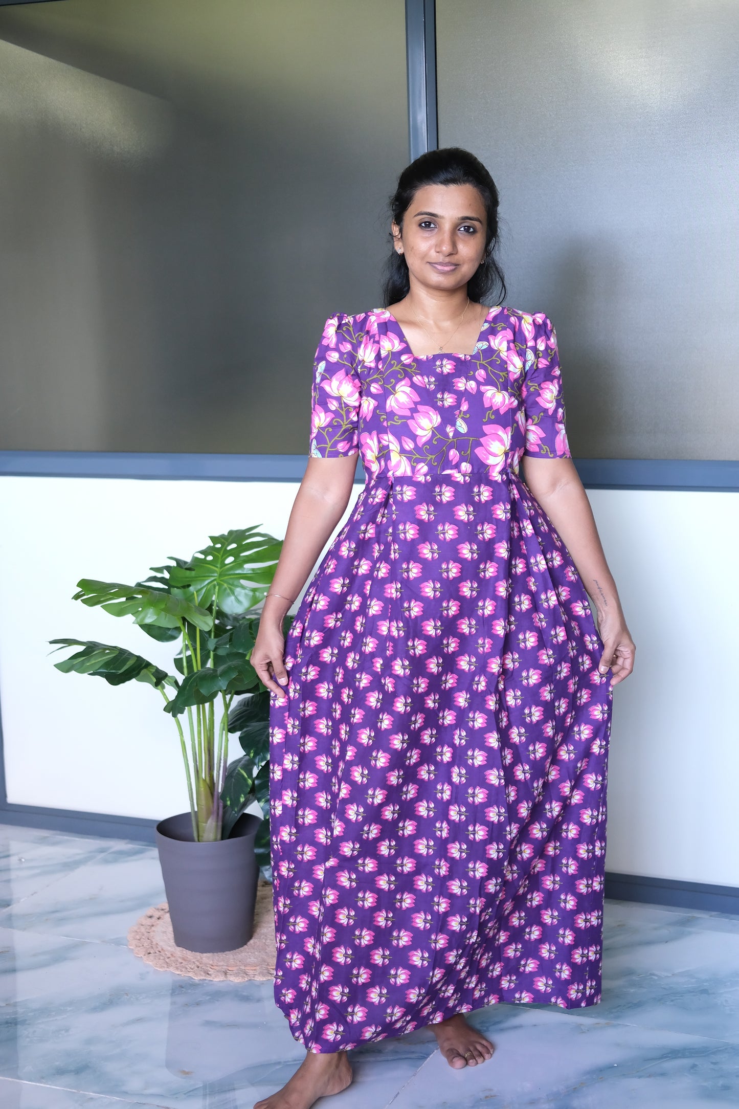 Full-length view of the relaxed fit violet ladies cotton nighty.
