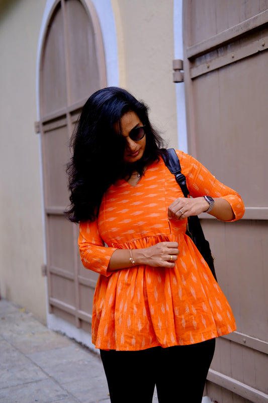 Isha - Orange Peplum Top