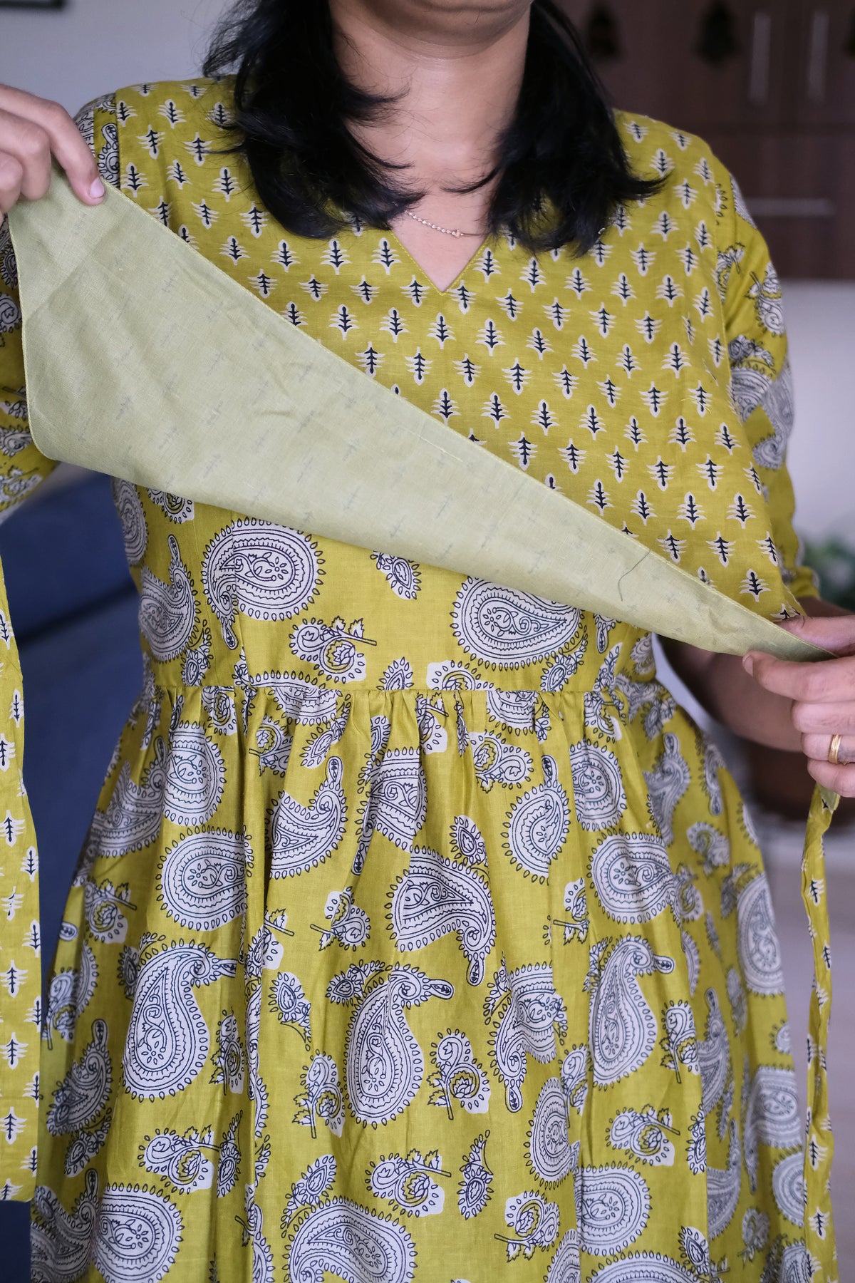 Close-up of the tie up cover on the mustard yellow cotton feeding nighty showing hidden nursing zips