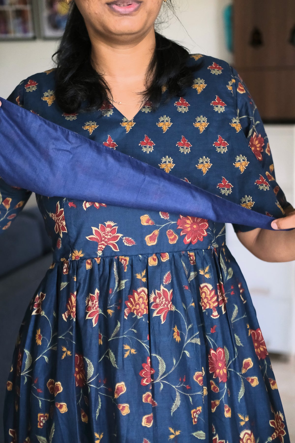 close-up of navy blue feeding nighty showing hidden nursing zippers and flap
