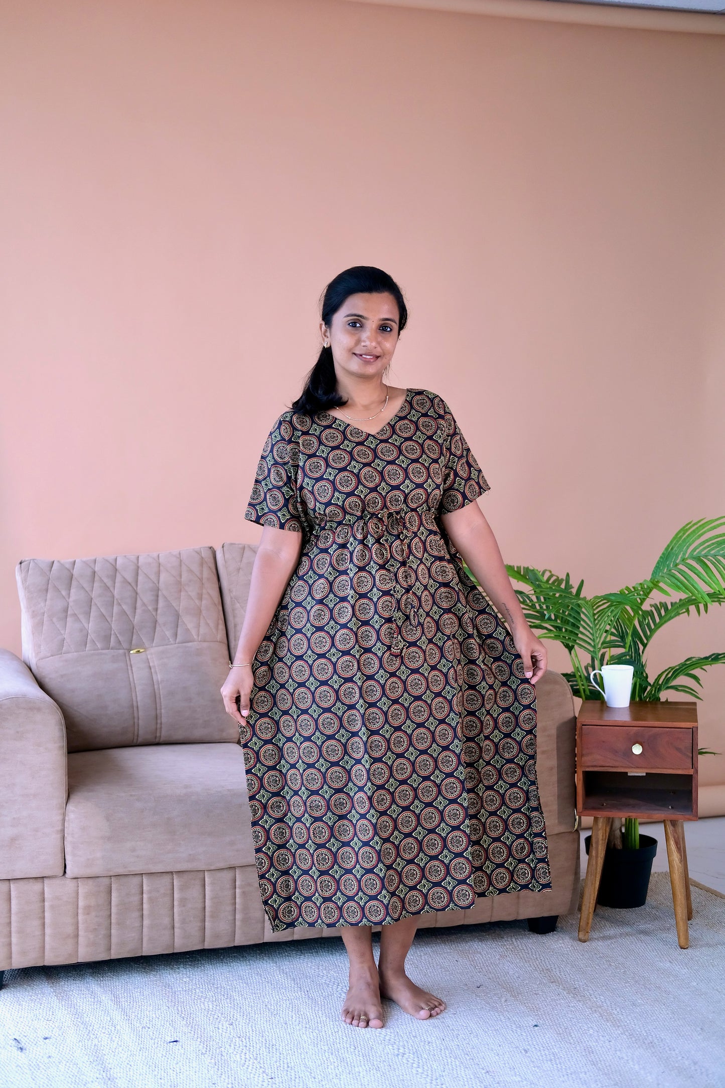 Full-length view of the ajrakh print nighty in soft cotton with short extended sleeves and a comfortable relaxed fit.