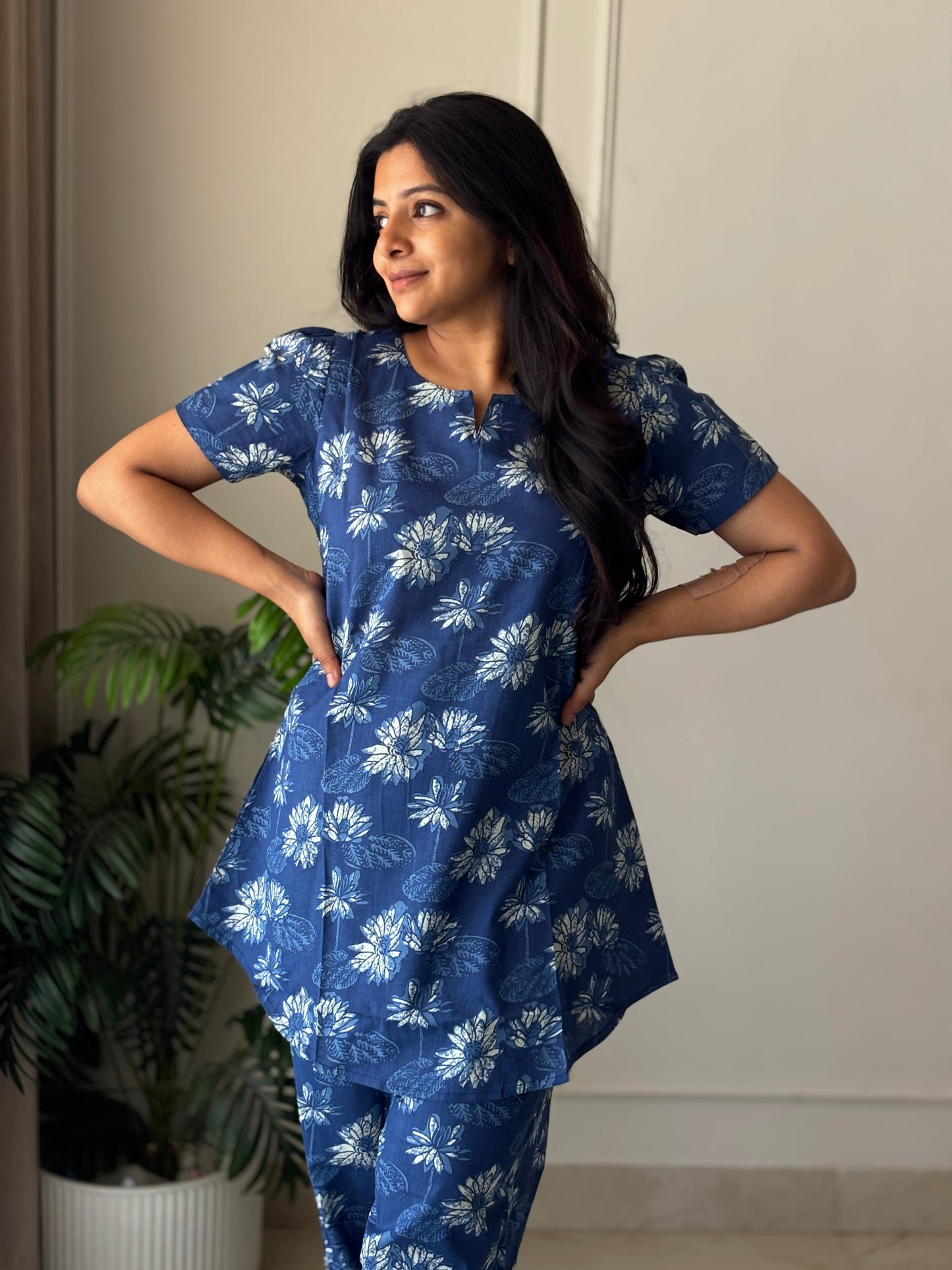 Close-up of the blue printed night suit set showing the split crew neckline and soft cotton fabric texture.