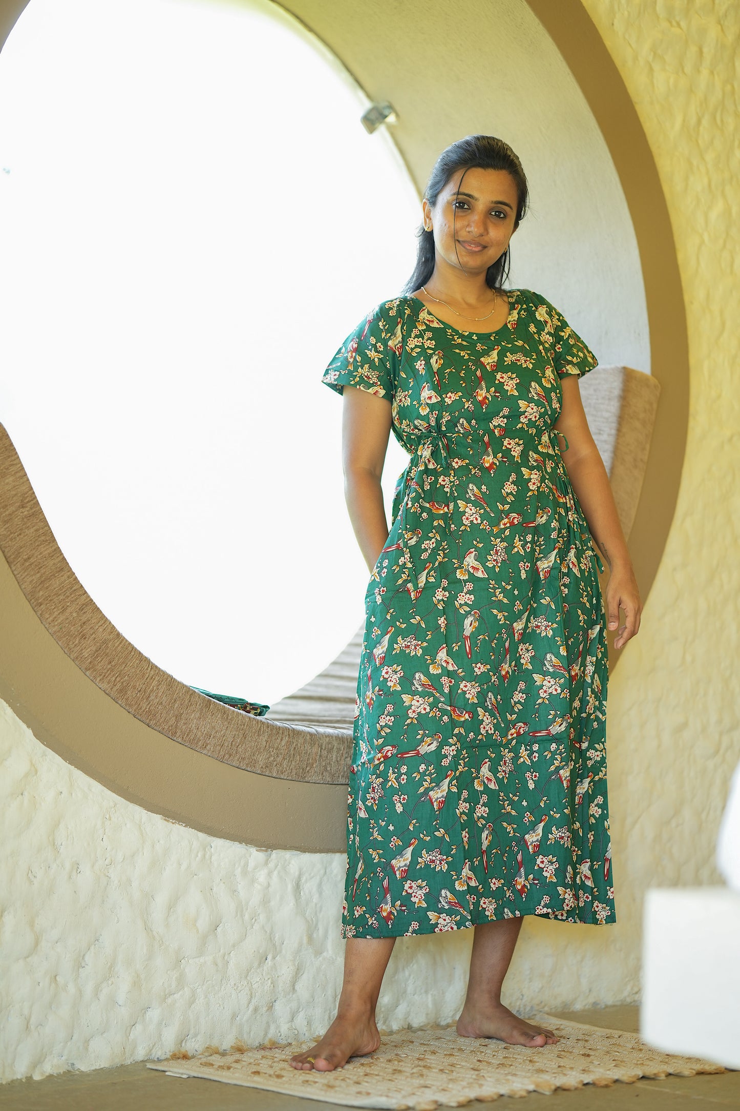 Maternity nighty with zip option in dark green cotton showing a convenient side pocket.