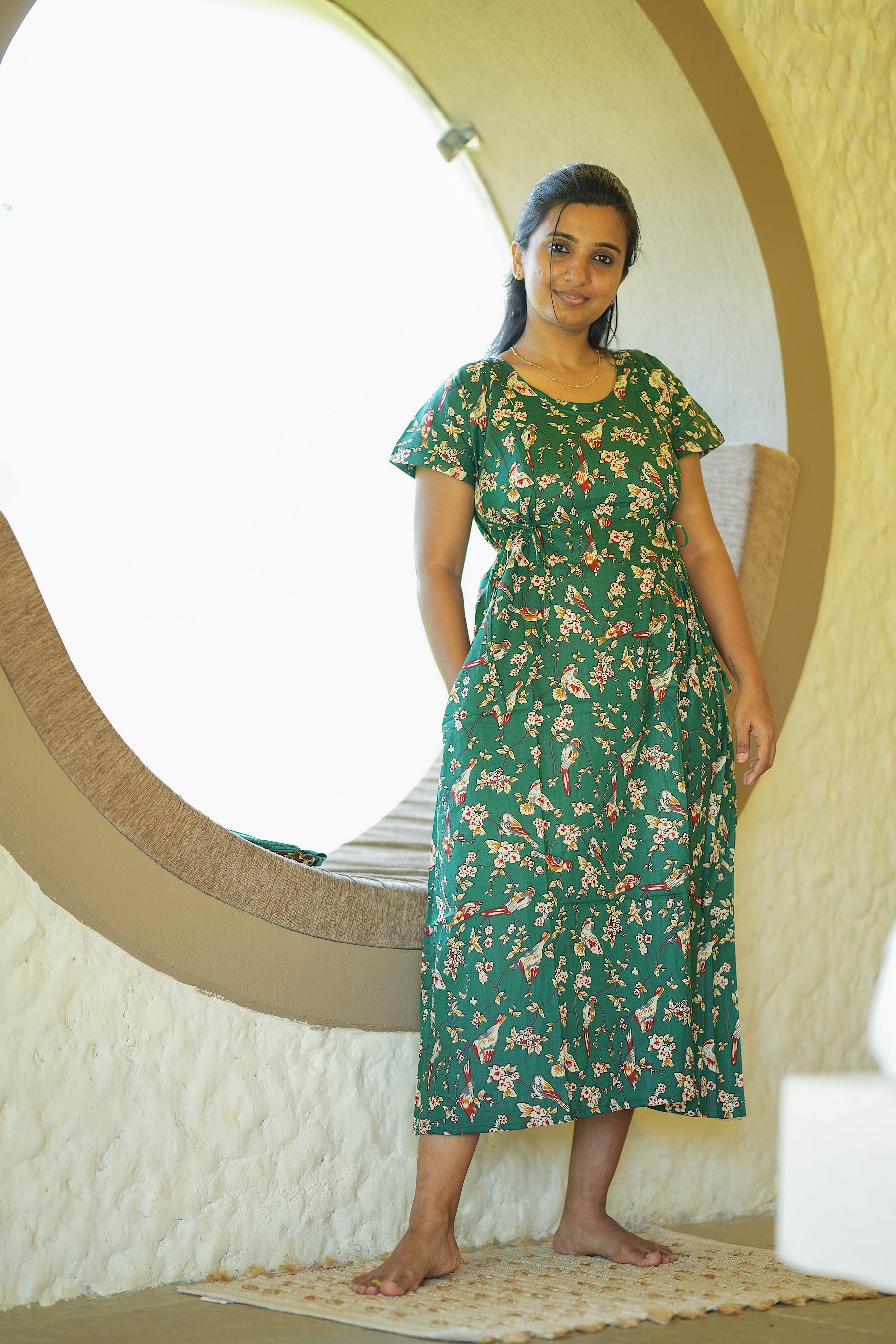 Maternity nighty with zip option in dark green cotton showing a convenient side pocket.