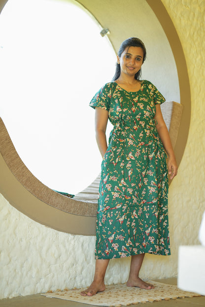 Maternity nighty with zip option in dark green cotton showing a convenient side pocket.