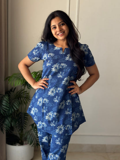 Full-length view of the blue floral cotton loungewear set with a relaxed-fit top and matching printed trousers.