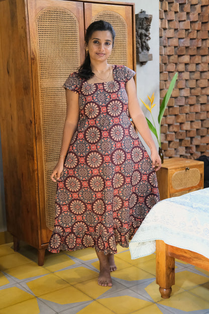 Full length view of printed midi nighty in maroon cotton