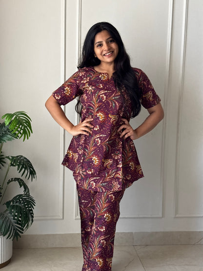 Front view of the Heera printed loungewear set in wine purple cotton with a V-notch neckline and straight pants.