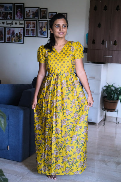 Comfortable yellow cotton maxi nighty with short puff sleeves, ideal for loungewear and maternity wear.