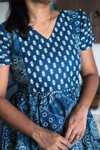 Close up of blue cotton nighty V-neck and block print