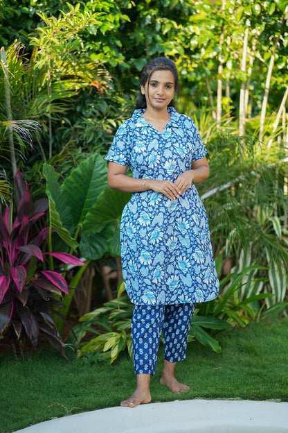 ladies cotton night suit - Blue printed cotton night suit top with floral pattern and matching geometric print pants.