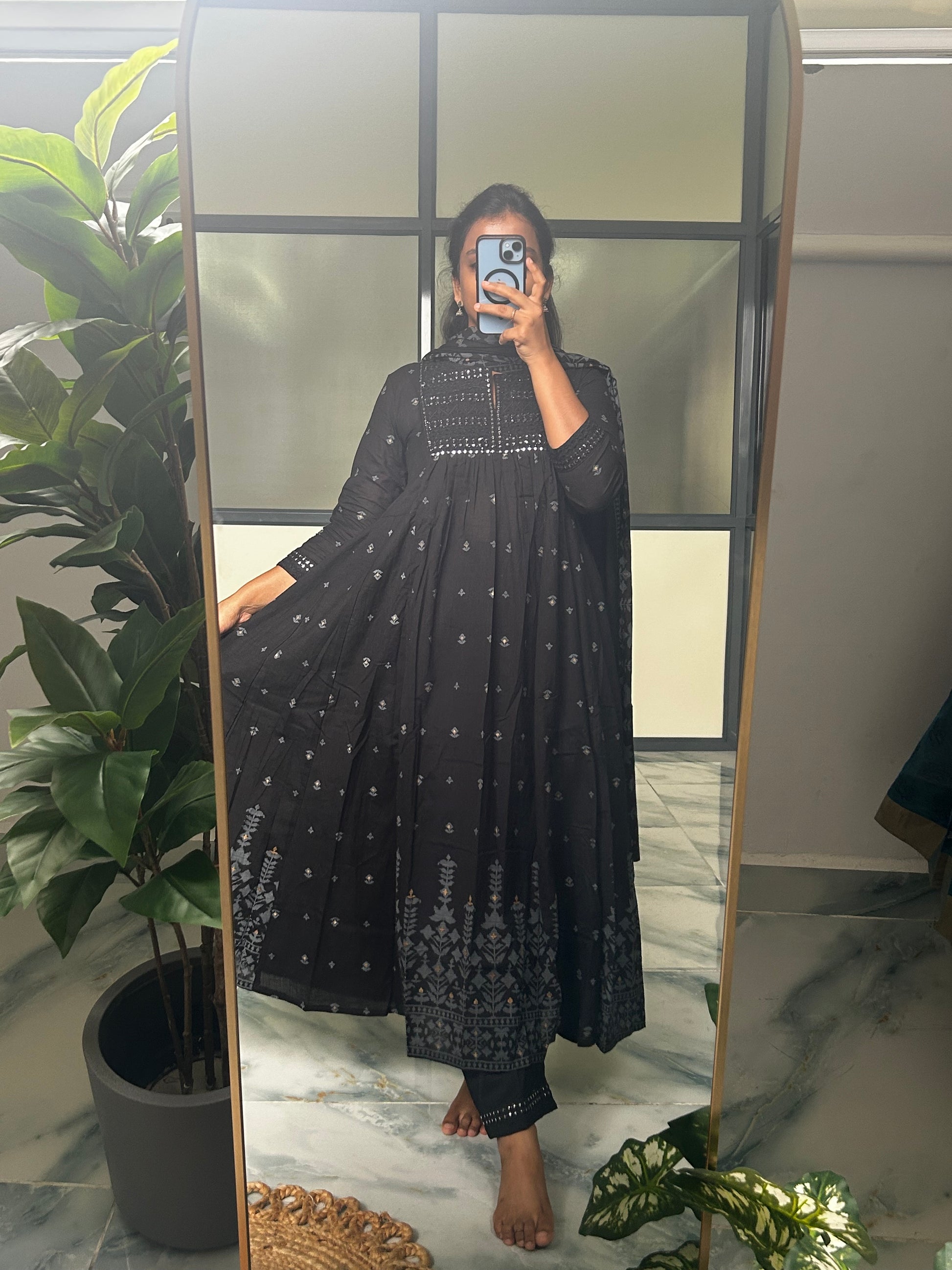 Flowy black cotton blend kurti with silver printed patterns