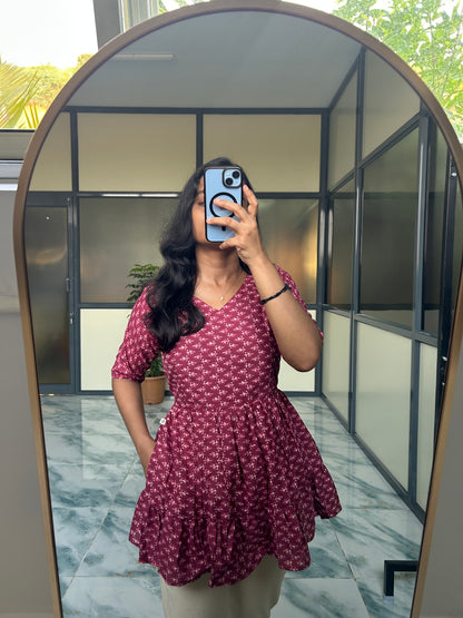 Sara - Magenta Nyra Cut Peplum Top