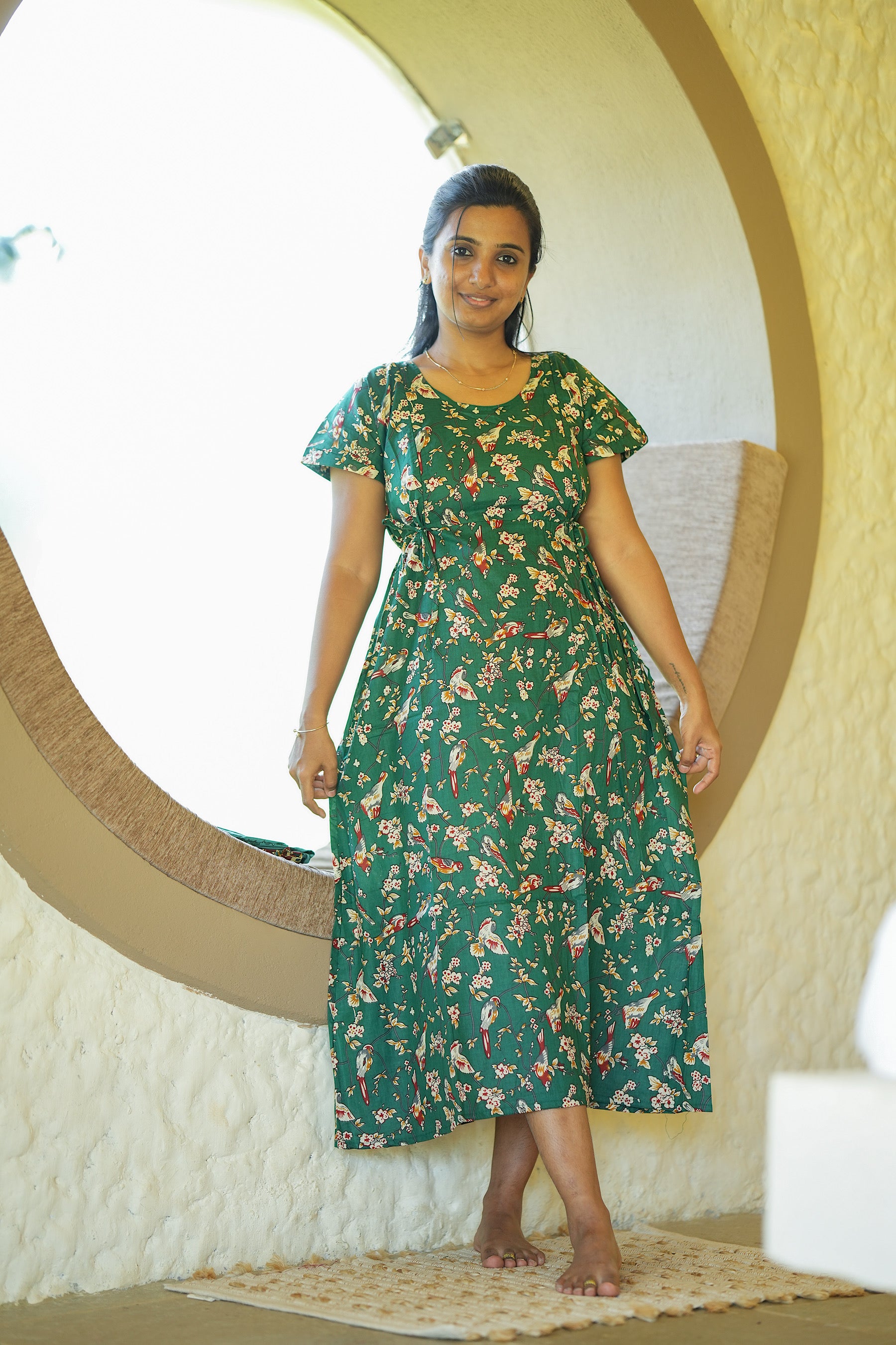 Comfortable adjustable tie nighty in dark green floral print, perfect for loungewear.
