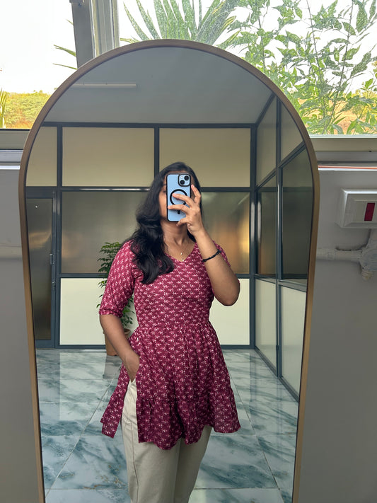 Sara - Magenta Nyra Cut Peplum Top
