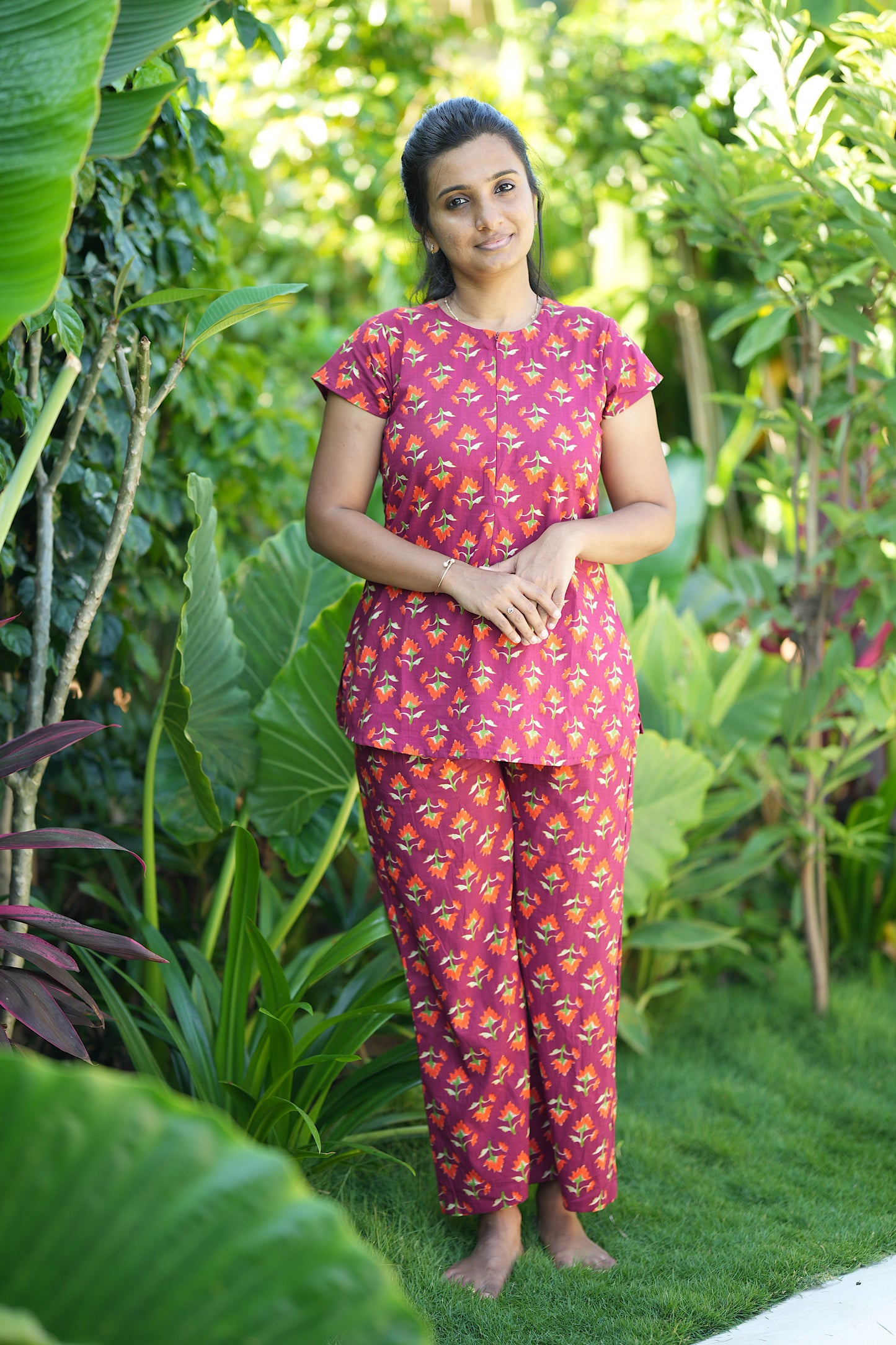 Full-length view of the Maya maroon printed night suit set designed for comfortable loungewear.