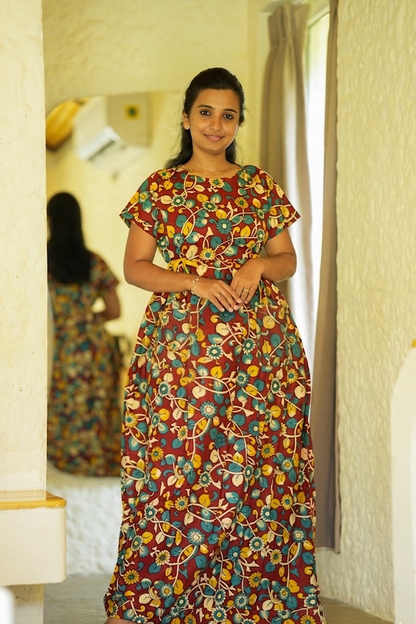 Full view of brown floral printed maxi nighty for women.