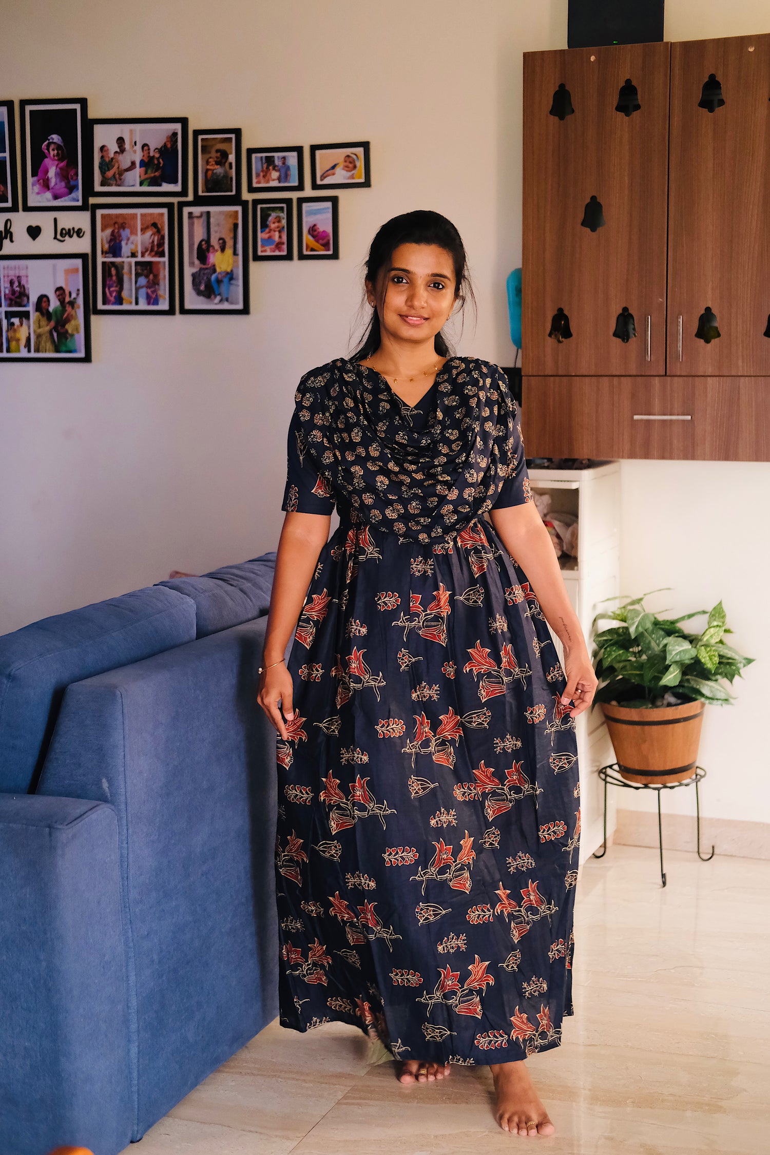 An ink blue cotton maxi nighty featuring a relaxed fit, short sleeves, and an attached chest drape.
