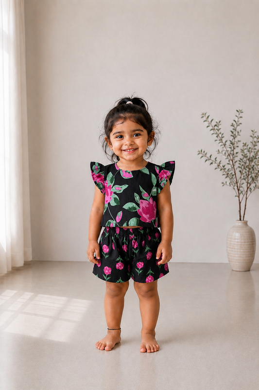 Adhira black floral kids co-ord set featuring ruffled sleeves and matching shorts