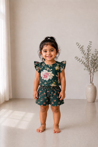 Adhira bottle green kids cotton co ord set with floral print and flutter sleeves