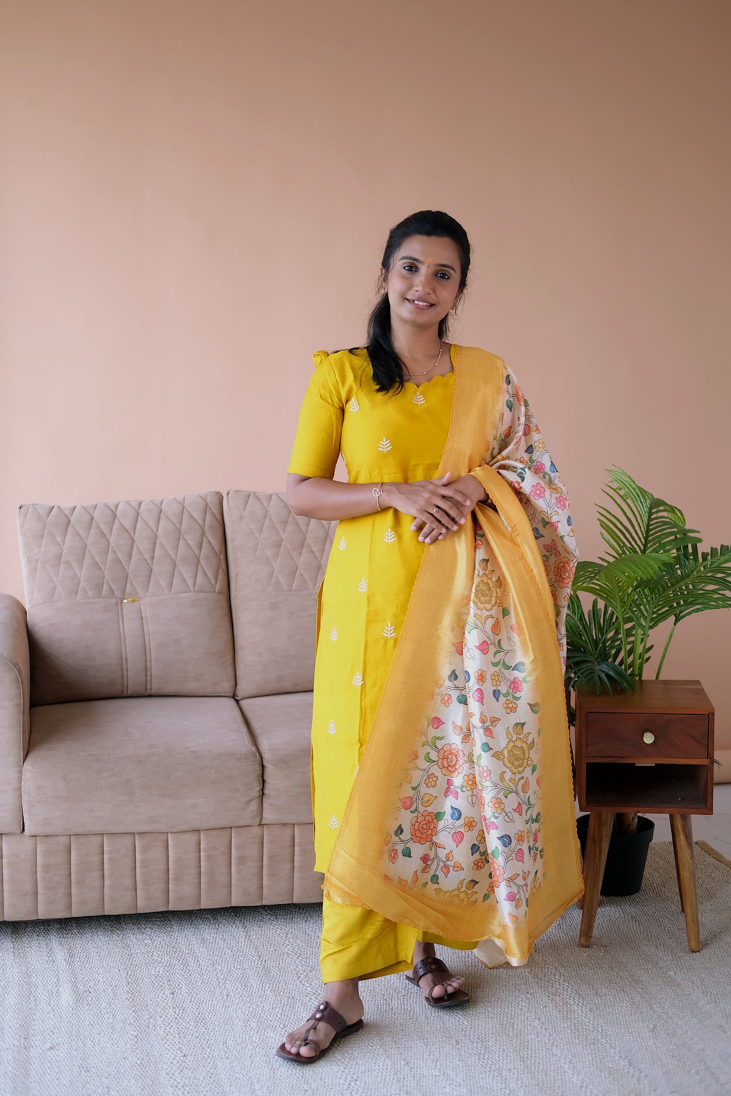 Brindha yellow kurti set with dupatta featuring a straight-cut embroidered yellow kurti, matching pants, and a floral printed dupatta.