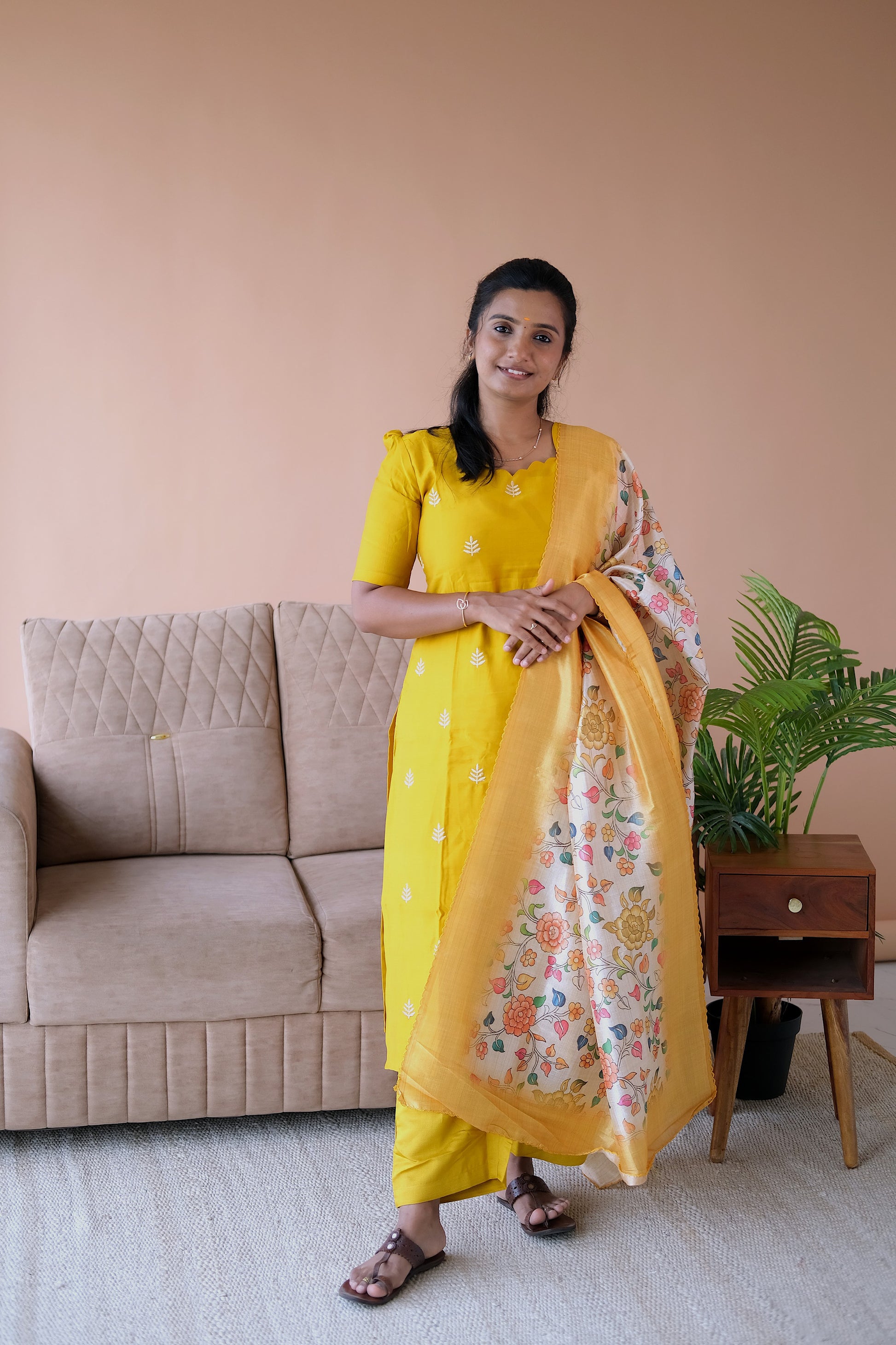 Brindha yellow kurti set with dupatta featuring a straight-cut embroidered yellow kurti, matching pants, and a floral printed dupatta.