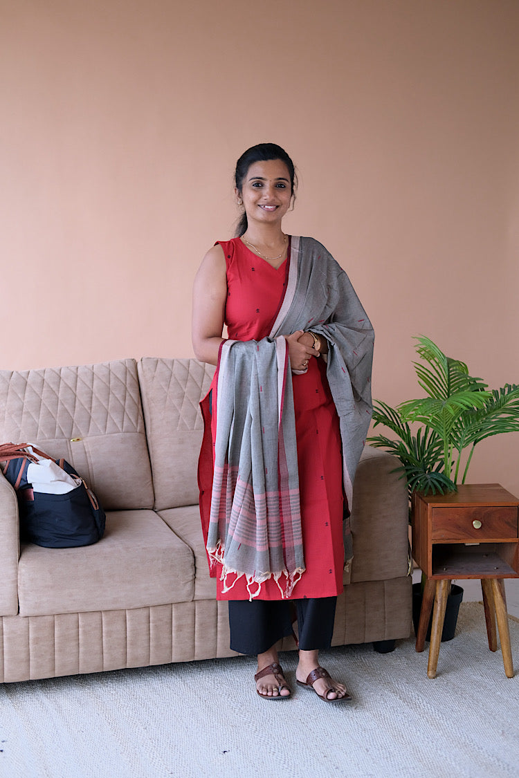 Front view of Manasa red cotton salwar set with sleeveless kurti and striped dupatta