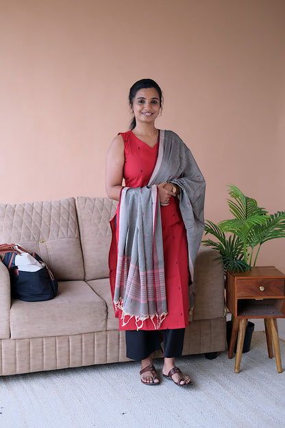 Front view of Manasa red cotton salwar set with sleeveless kurti and striped dupatta