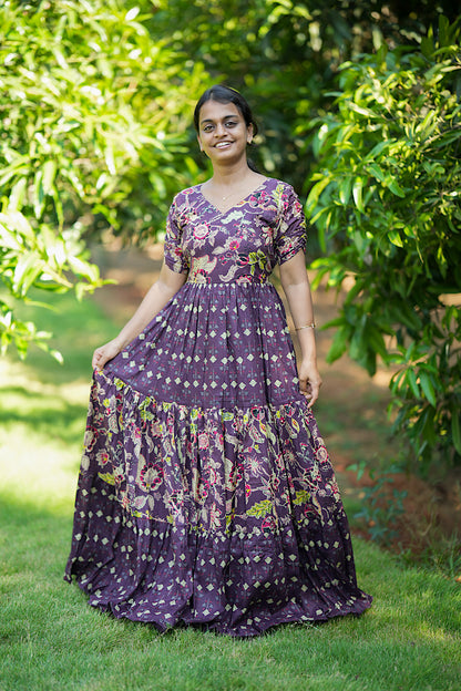 Front view of the violet printed long dress featuring V-neck and gathered sleeves