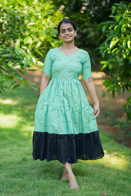 Mint green and black tiered cotton maxi dress with V-neck and ruched sleeves