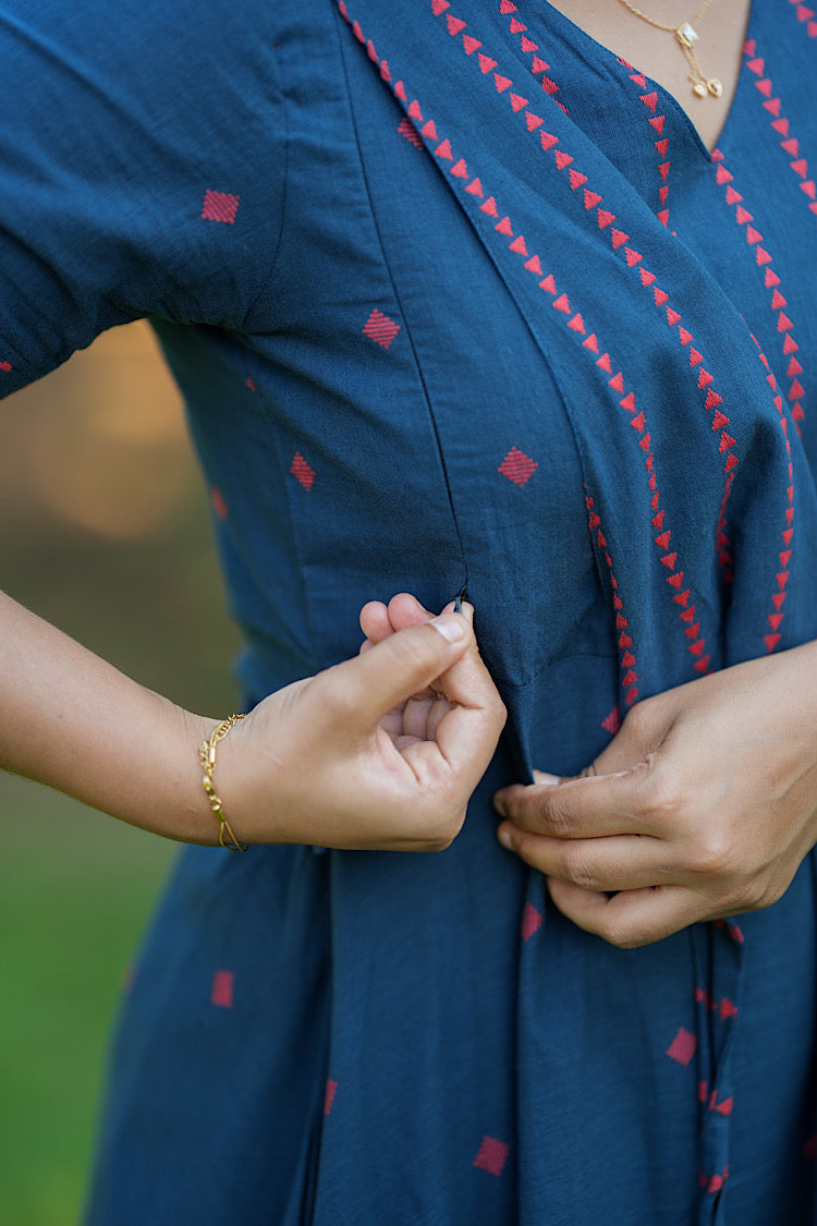 Close-up showing the hidden vertical zipper on the side bust of the feeding friendly maxi dress.
