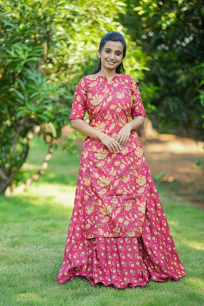 Deep pink cotton multiwear maxi dress layered with a matching Kalamkari floral print kurti