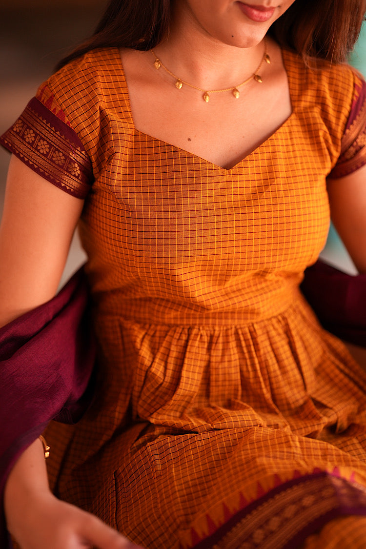 Detailed shot of bodice and woven shoulder border