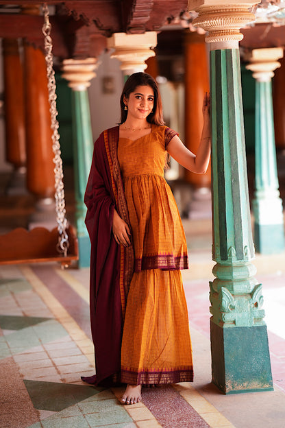Frontal view of 3 piece mustard ethnic suit set