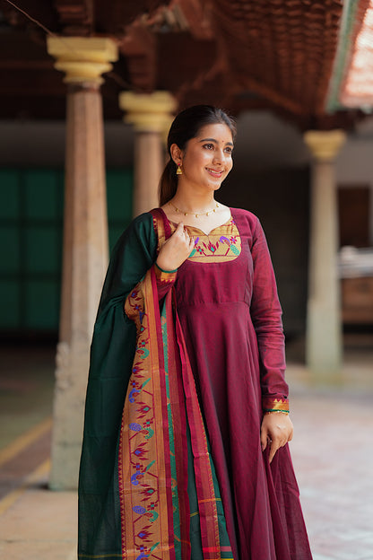 Side profile of the maroon cotton anarkali suit with dupatta showing the green side panels.