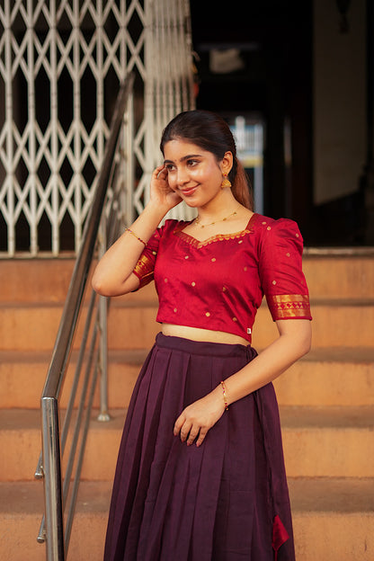 Close-up of the red crop top with puff sleeves and sweetheart neckline