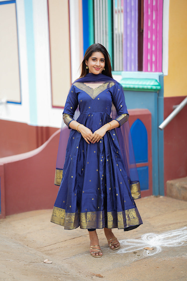 Royal blue silk anarkali suit with gold zari scalloped V-neck and matching net dupatta