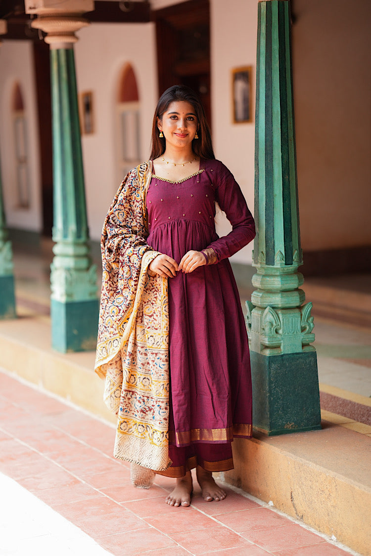 Maroon alia cut cotton kurti set with gold zari borders and a contrast Kalamkari dupatta