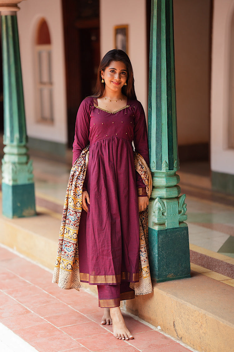 Back view of the maroon kurti set with dupatta draped elegantly over the shoulder