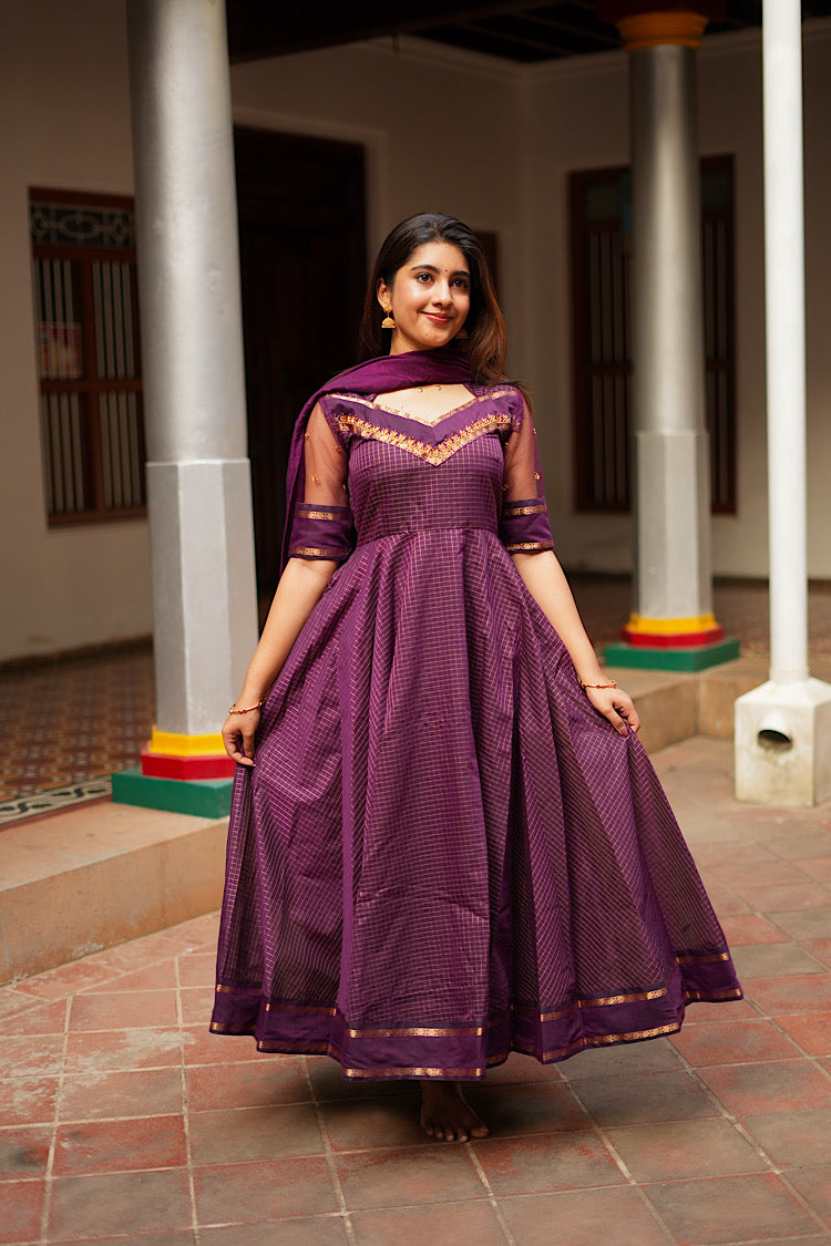 Aarya designer anarkali dress in deep vine purple with sheer net elbow sleeves.