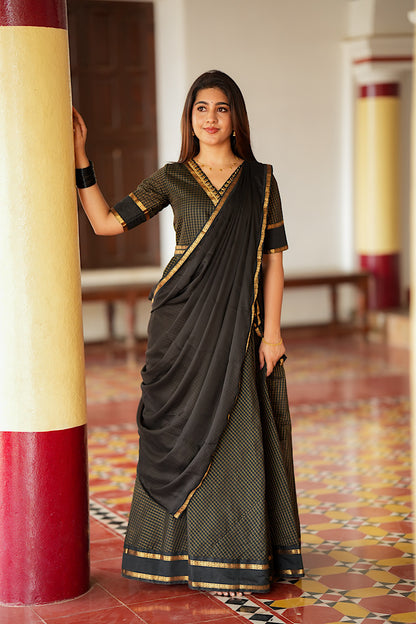 Black silk multiway dress styled with a draped dupatta like a saree pallu