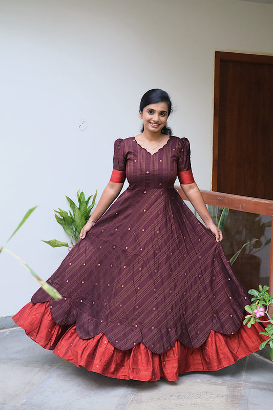 Anvitha coffee brown and rust orange ethnic maxi dress with a double-layered flared skirt and scalloped hem.