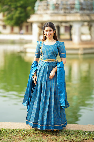 Peacock blue Aarani silk half saree set with gold zari checks and pleated skirt