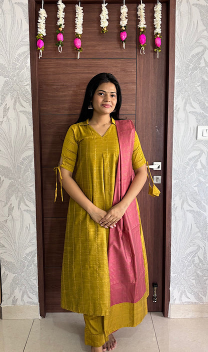 mustard kurta set with dupatta - Mustard yellow A-line kurti set with dupatta featuring collar V-neck and sleeve tie-ups