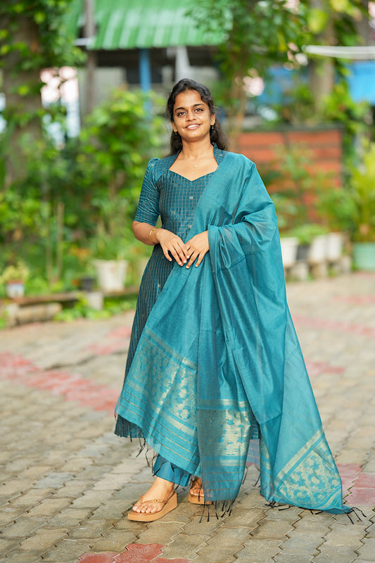 Damayanthi teal blue kurta set with dupatta worn outdoors