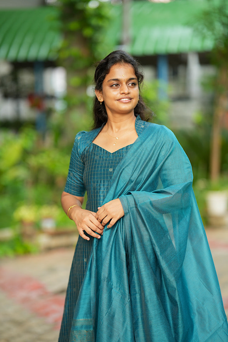 Close-up of high collar neck and puff sleeves on teal blue kurti