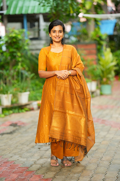 Mustard yellow kurti set with dupatta featuring zari woven check pattern and flared A-line cut