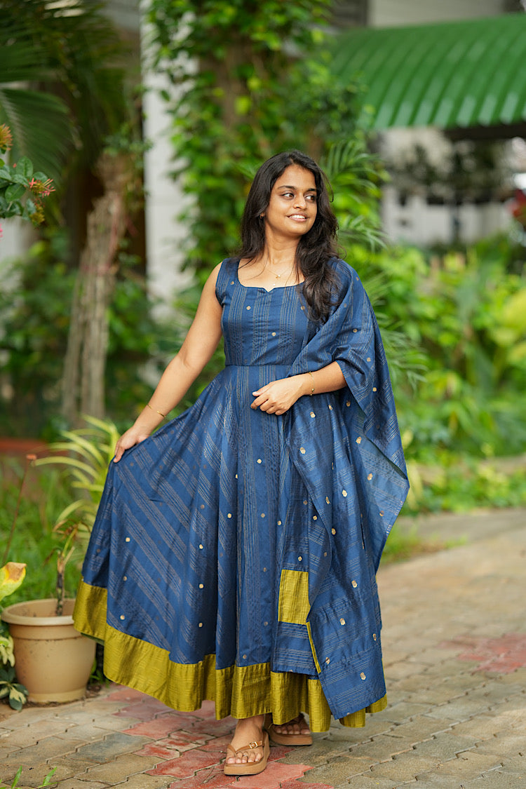 Full length view of blue green woven raw silk anarkali suit with matching dupatta