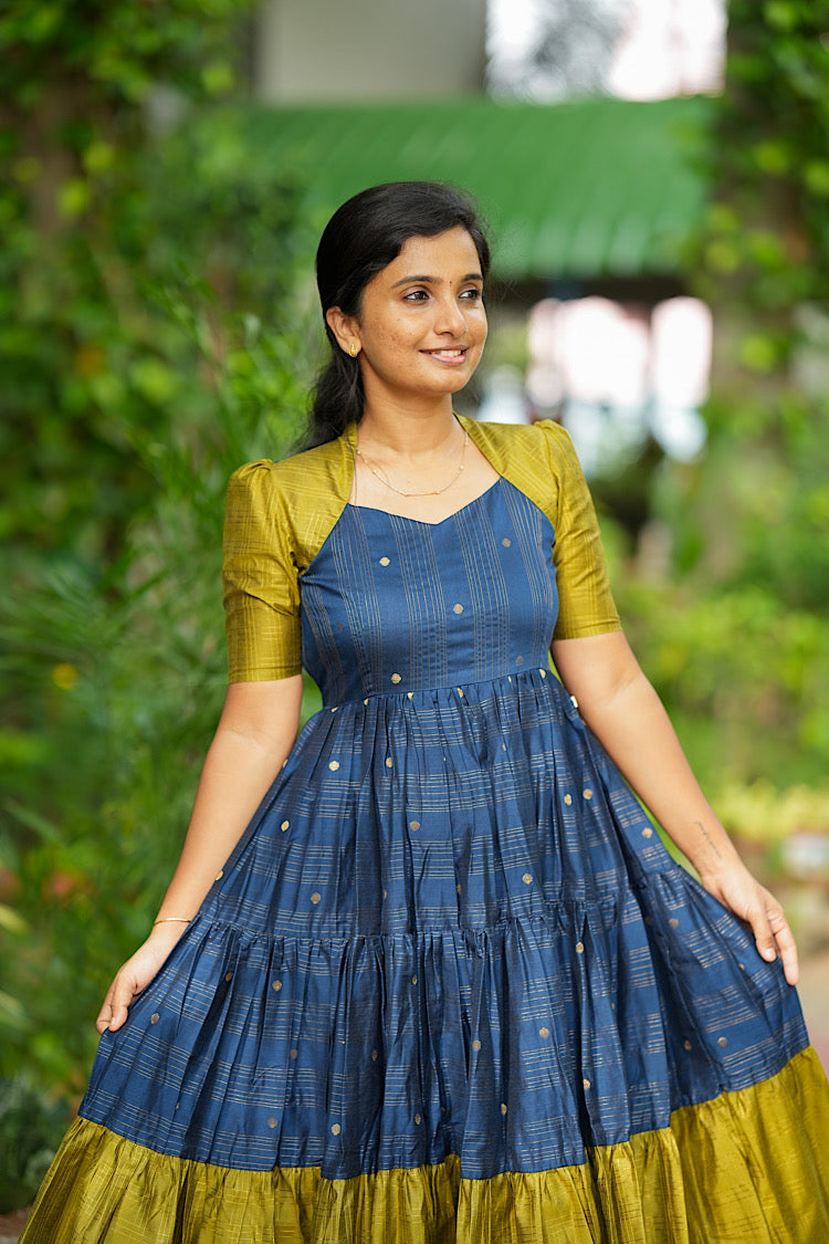 Side angle view of blue and green raw silk midi dress bodice and sleeves